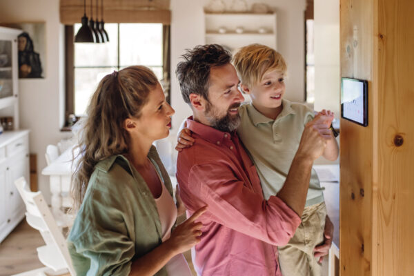 family choosing best thermostat setting for summer